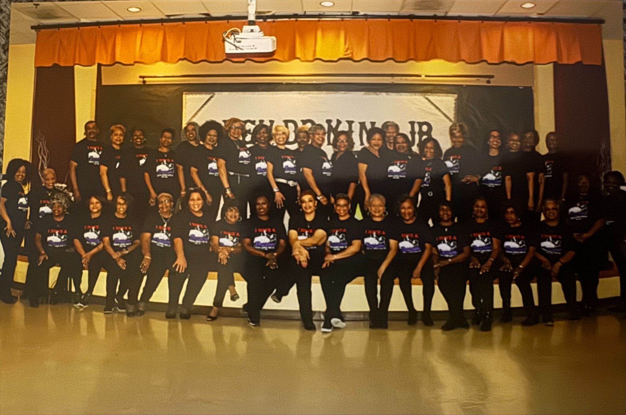 Orange Mound Line Dancers posing together on stage